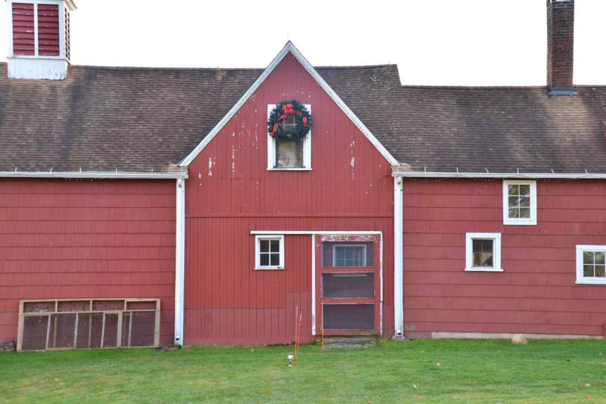 Westmoor Park's classic red barn is dressed up with a wreath for the holidays. Photo credit: Deb Cohen