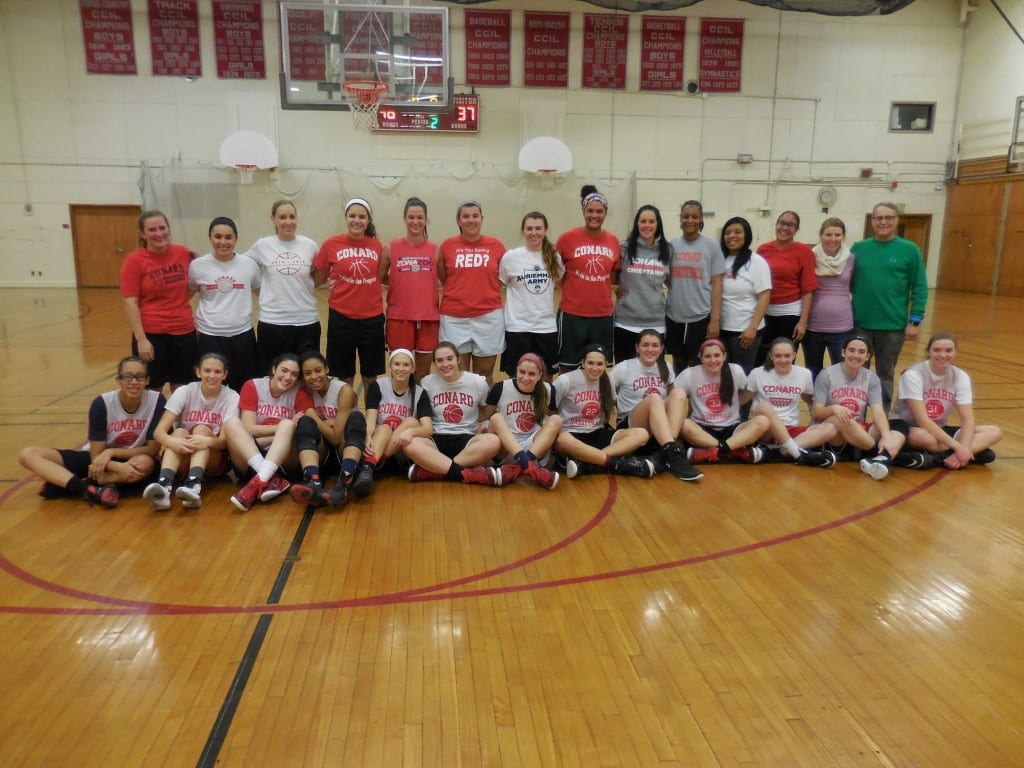 The alumni and Conard team pose for a picture at the conclusion of their game. Submitted photo