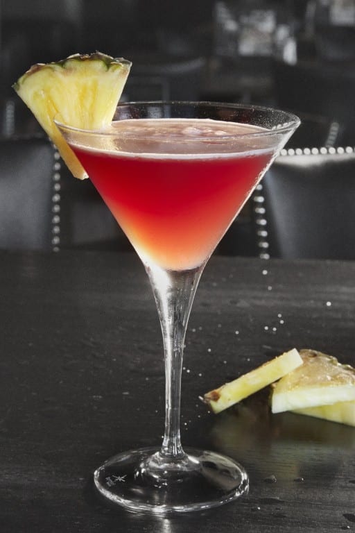 The Diva is one of Bar Louie's signature martinis and contains SKYY Pineapple, PAMA Liqueur, pomegranate syrup, pineapple juice, and fresh-cut pineapple. Photo courtesy of Bar Louie