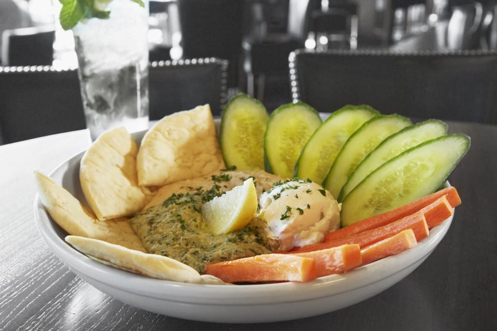 Hummus, Pesto Hummus, and Tzatziki is a popular appetizer at Bar Louie. Photo courtesy of Bar Louie