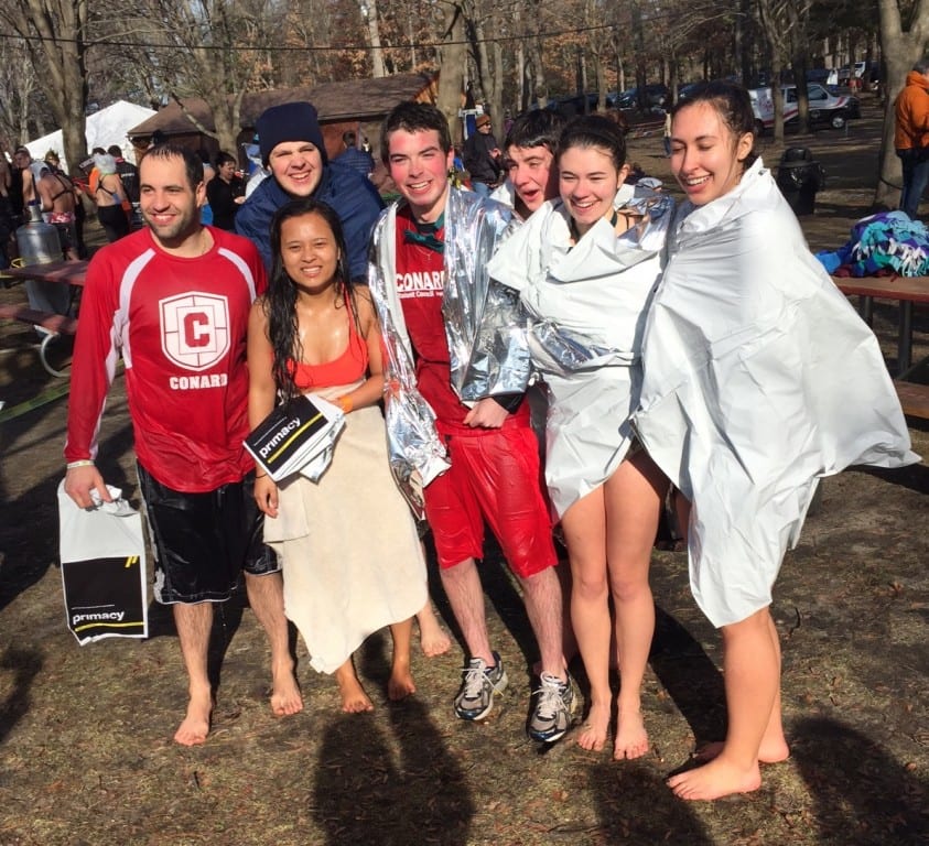Representatives of West Hartford's Conard High School, including Principal Julio Duarte (left), take the plunge for Special Olympics CT. Submitted photo