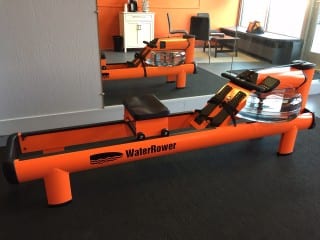 The water rower is one of the state-of-the-art pieces of equipment used in an Orangetheory workout. Photo credit: Ronni Newton