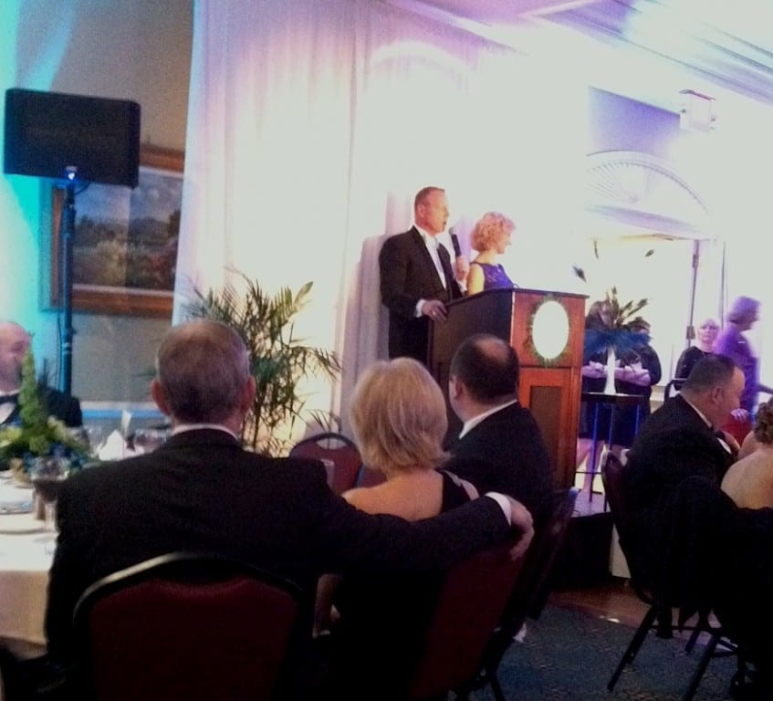 Scot Haney auctions off a diamond necklace donated by Monarch Jewelers for $2,300. 17th annual Children's Charity Ball, Jan. 23, 2016. Photo credit: Tom Hickey