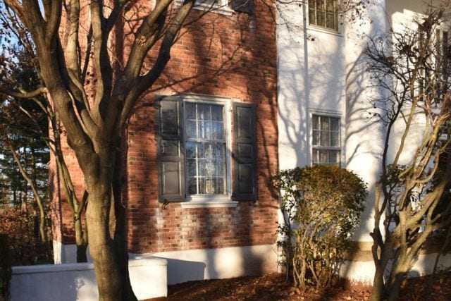 Shadow play on the home's brick facade. Photo credit: Deb Cohen