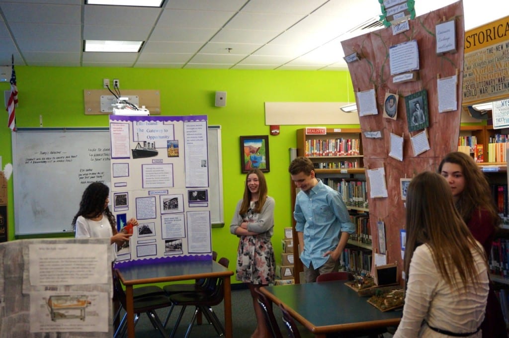 Students show off their exhibits to administrators, faculty, parents, and other students on History Day at Sedgwick Middle School. Photo credit: Ronni Newton