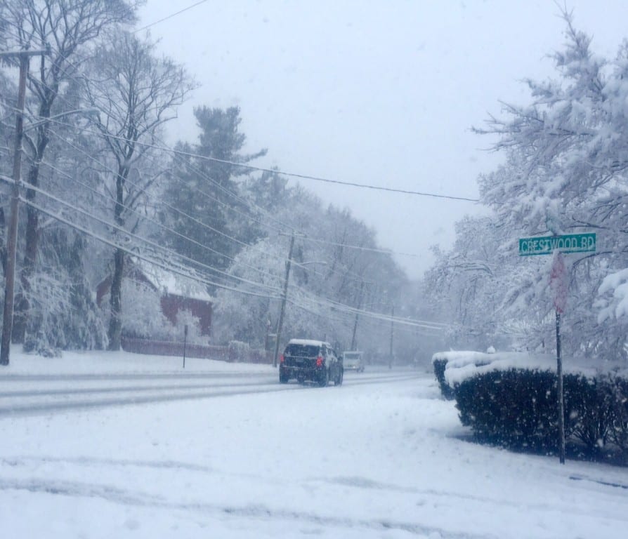 Traffic is moving slowly on South Main Street near the Noah Webster House in West Hartford. Photo credit: Ronni Newton