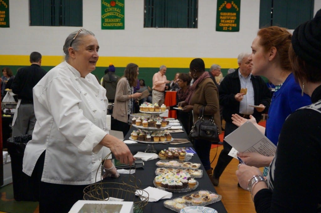 Guests sample Classic Cakes at Taste of Elmwood. Feb. 4, 2016. Photo credit: Ronni Newton