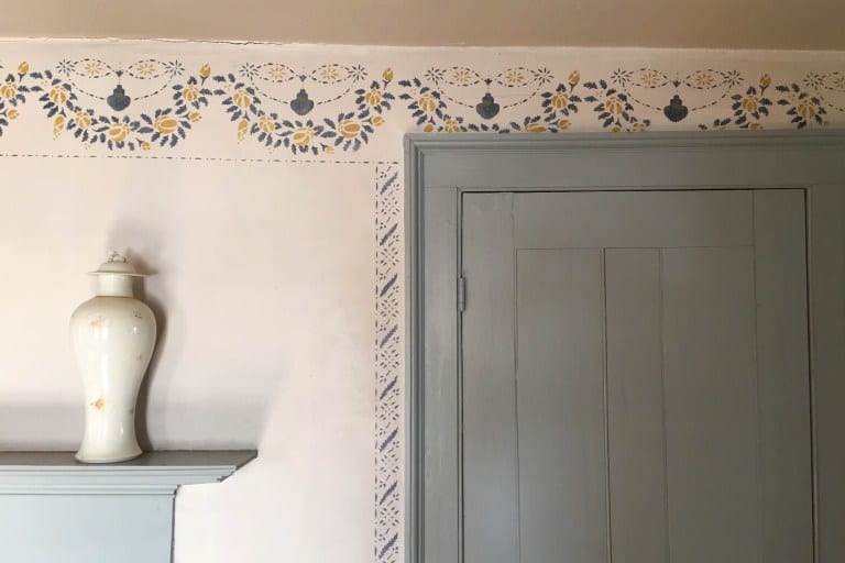 Intricate wall stenciling in the room re-created as the dining room. Photo credit: Deb Cohen