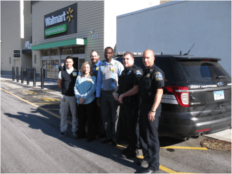 West Hartford Police Department representatives with Walmart management. Submitted photo