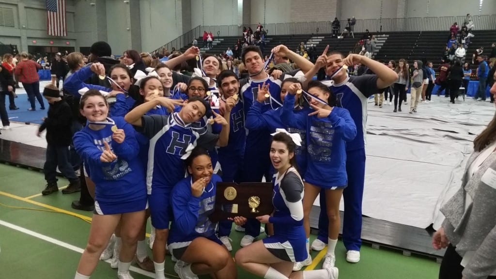 Hall HIgh School cheerleaders with first place medals in the Connecticut State Championship. Photo courtesy of John Lyons.