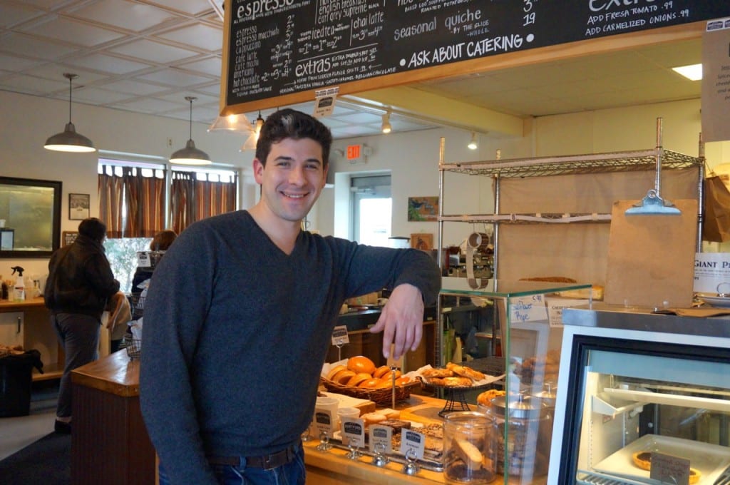 Scott Kluger, Hartford Baking Company owner, stands at the counter of the New Park Avenue location. Photo credit: Ronni Newton