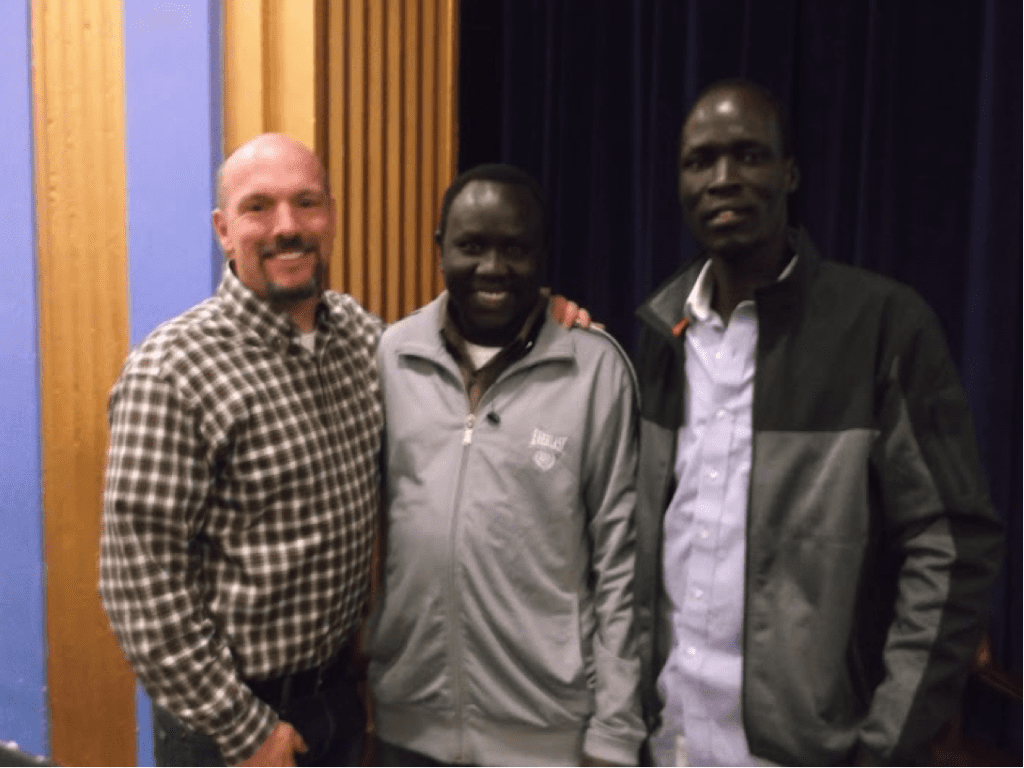 From left: Sedgwick social studies teacher Stephen Kay with former 'Lost Boys' Abraham Deng and Dut Tong. Submitted photo