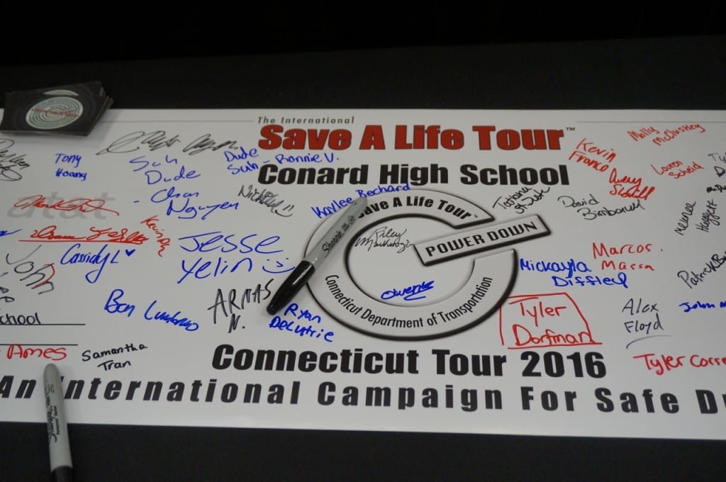 The safe driving pledge was quickly filled with signatures of students who participated in the Save a Life Tour. Photo credit: Ronni Newton