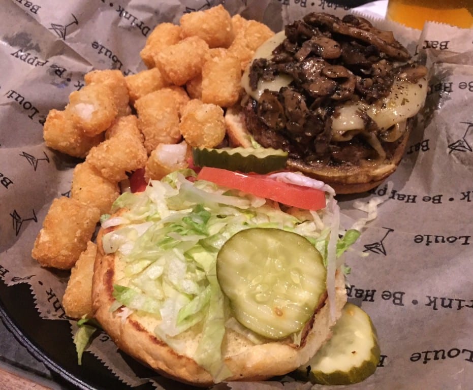 Philly burger and tots. Bar Louie. Photo credit: Ronni Newton