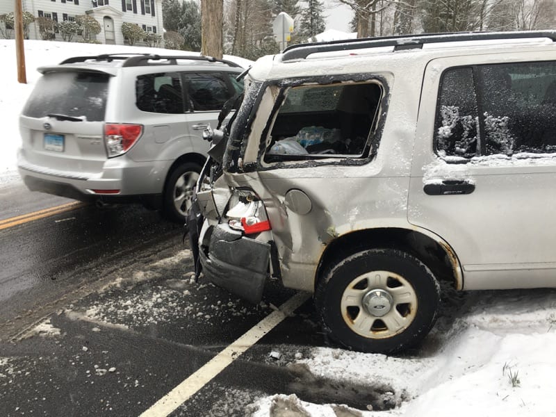 This Ford Explorer sustained heavy damage when it collided with a school bus on North Main Street Monday morning. Photo courtesy of West Hartford Police