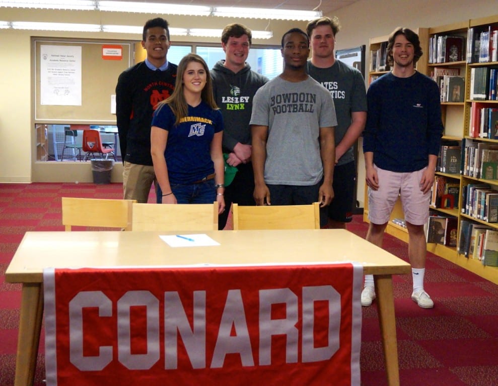 Conard students committed to college athletics on Monday. Front row, from left: Kylie Bell, Nate Richam, Tyler Grainger. Back row from left: Matthew Morales, Patrick Corcoran, Phil Simplicio. Missing from photo: Jordan Lohneiss, Jessica Lohneiss, Nicole Kradas. Photo credit: Ronni Newton