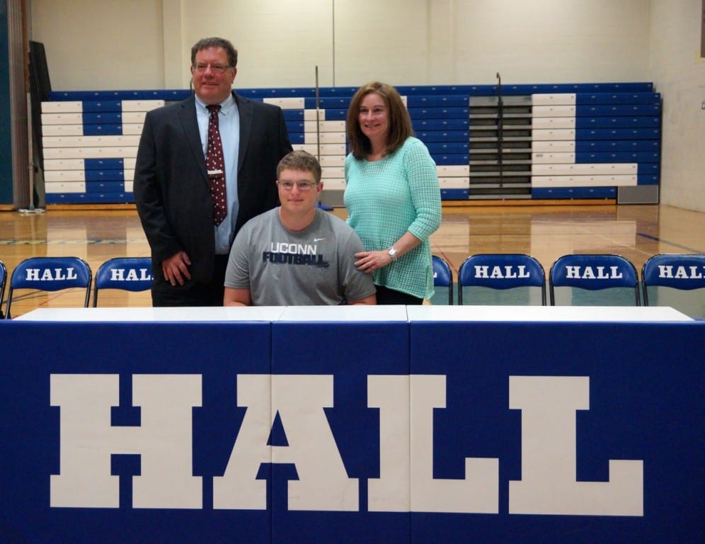 Harrison Newman with his parents. Photo credit: Ronni Newton