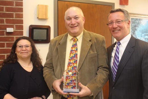 Melissa Bogatz, coordinator of volunteers at Saint Mary Home, volunteer Howard Hahn, and Bill Fiocchetta, president and CEO of The Mercy Community, celebrate his 2016 Volunteer of the Year Award win. Submitted photo