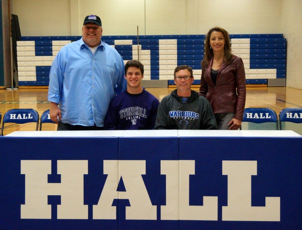 Tyler Strickling with coach Frank Robinson (seated) and his parents. Photo credit: Ronni Newton