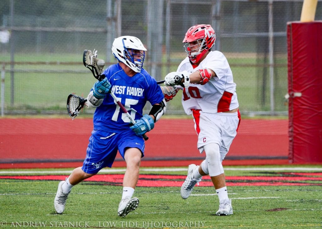 The Conard boys lacrosse team came on strong vs. West Haven on Saturday. Photo credit: Andy Stabnick. Low Tide Photography