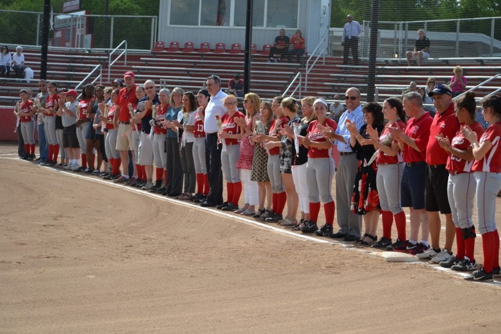 11 of the 13 players on the Conard varsity softball team are seniors, and posed with their parents before the Mayor's Cup game on Monday, May 23, 2016. Photo courtesy of Liz Proietti