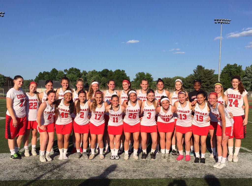 The Conard girls lacrosse team poses for a photo after defeating Simsbury 15-2 in the first round of Class L tournament action. Photo credit: Ronni Newton