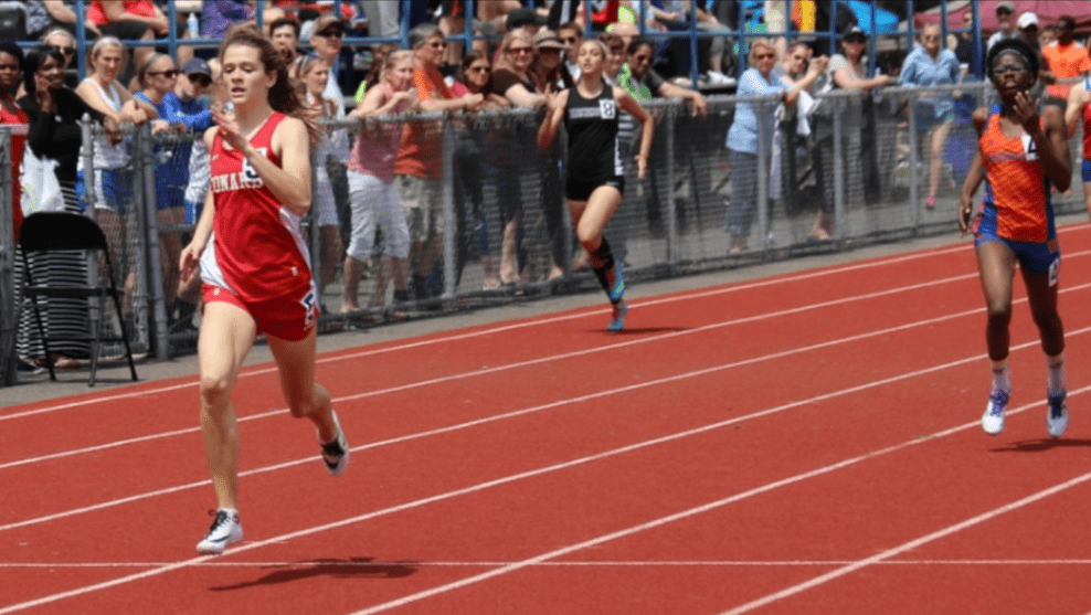 Libby McMahon nearing the finish line to win the Girls 400 meter dash in 57.85 seconds at the 85th Greater Hartford Invite. Photo courtesy of Chris McMahon