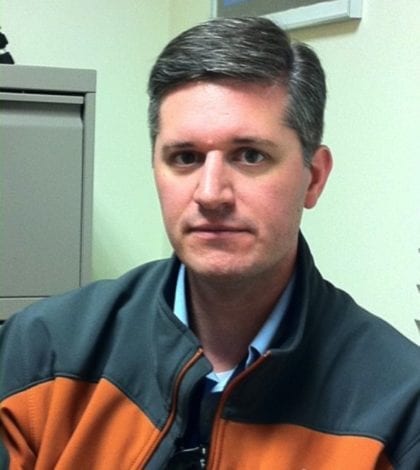 scott slifka in orange jacket