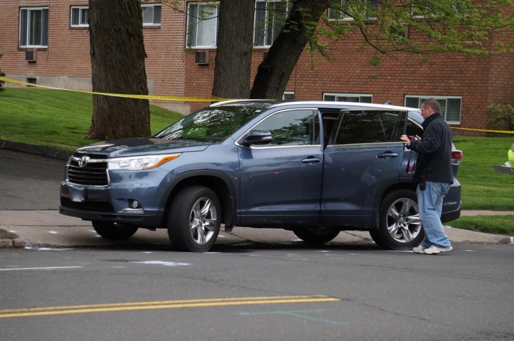 The driver of a scooter lost control and collided with a Toyota Highlander Saturday afternoon in West Hartford. Photo credit: Ronni Newton