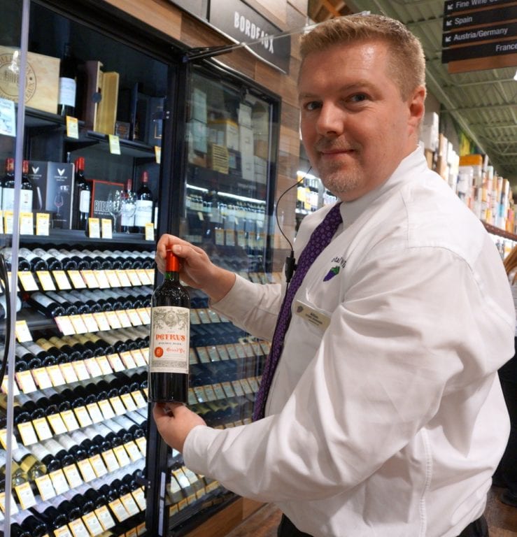 Store Manager Alton Blakeslee carefully shows off a $4,999 bottle of Chateau Petrus Pomerol. Total Wine & More. 1451 New Britain Ave., West Hartford. Photo credit: Ronni Newton