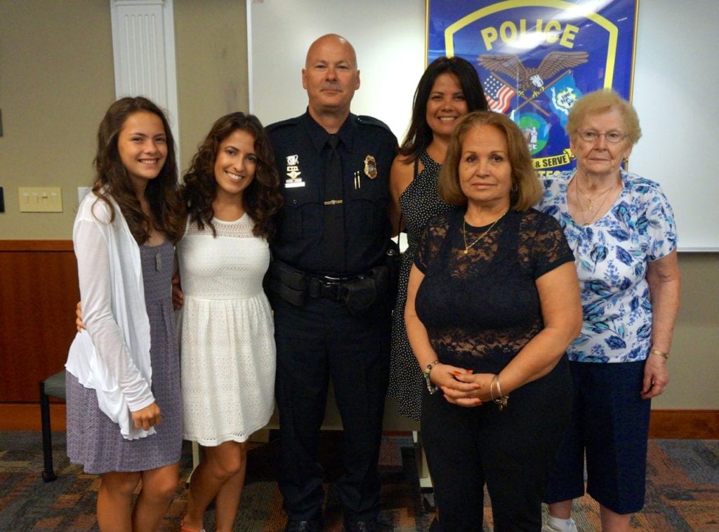 Kerry Cloukey (center) with his wife Nadine and other family members. Photo credit: Ronni Newton