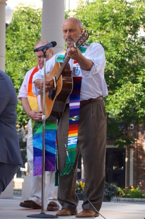 Mark Diters of Flagg Road UCC leads the singing of Pete Seeger's 'Where Have All the Flowers Gone.' Vigil, June 15, 2016. Photo credit: Ronni Newton