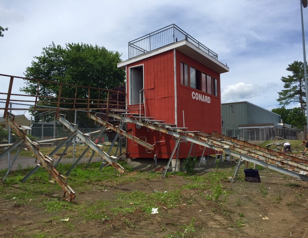 Conard High School's old bleachers are being demolished and new bleachers and a new press box should be ready for the fall 2016 sports season. Photo credit: Ronni Newton