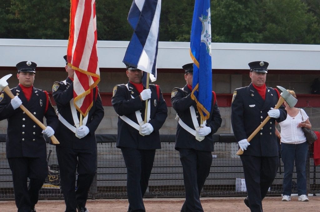 West Hartford Fire Department color guard carries the U.S. and Cuban flags. USA-Cuba Goodwill Tour. University of Hartford. July 11, 2016. Photo credit: Ronni Newton