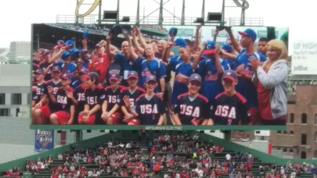 Team Cuba and the West Hartford team on the Jumbotron at Fenway Park. Photo courtesy of Tim Brennan