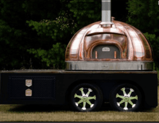 Savoy Pizzeria won't open its restaurant on LaSalle Road until September, but Chef Dante Cistulli is ready to take the pizza on the road with this wood-fired pizza oven. Courtesy of Savoy Pizzeria