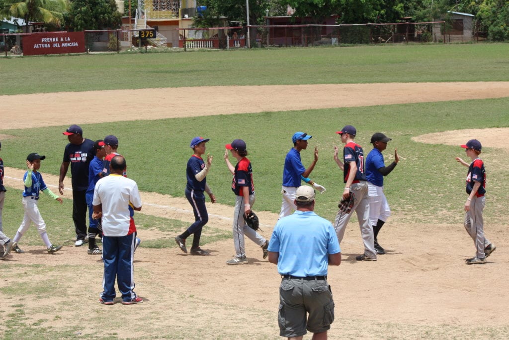U.S. and Cuban teens congratulate each other after a game in Holguin, Cuba, in April. Photo credit: Luke Giroux