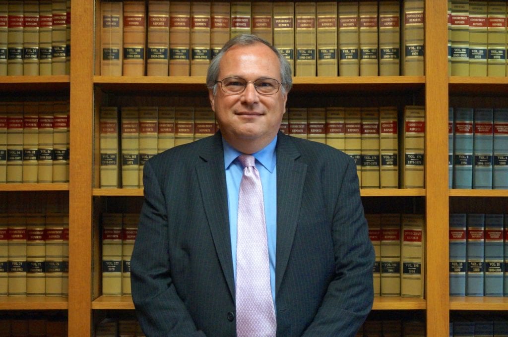 Patrick Alair has worked in the town's Office of Corporation Counsel since 1986. Photo credit: Ronni Newton
