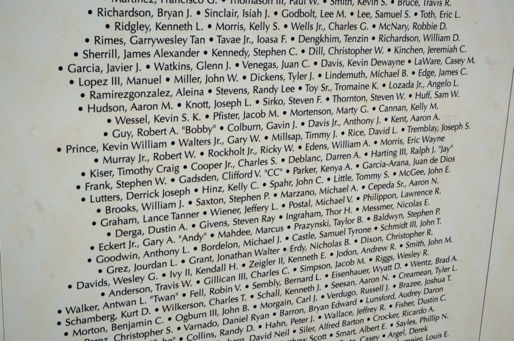 The name of West Hartford resident and U.S. Marine LCpl Lawrence Philippon appears about halfway down on the far right of the center column of the sixth panel. Photo credit: Ronni Newton