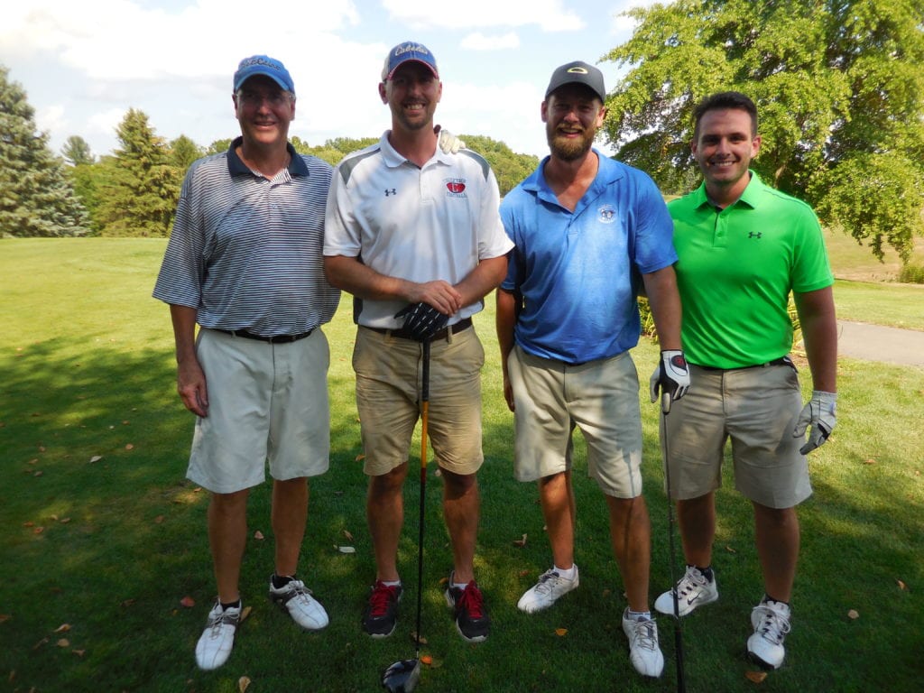 John McCormick (Class of '75) with Steve Brouse, Ryan Roberts and Jordan Tirone (Class of '06). Submitted photo