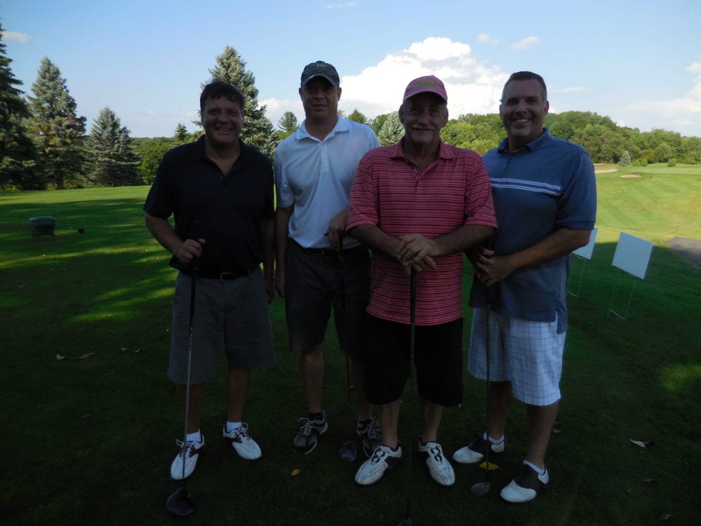 Sam Campitelli (Class of '83) with Mike Mangiafico, Dave Peterson and Kevin Digby (Class of '90). Submitted photo