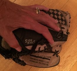 I found Sam's pint-sized baseball glove on his floor after dropping him at UConn, and that was what brought on the tears. Photo credit: Ronni Newton