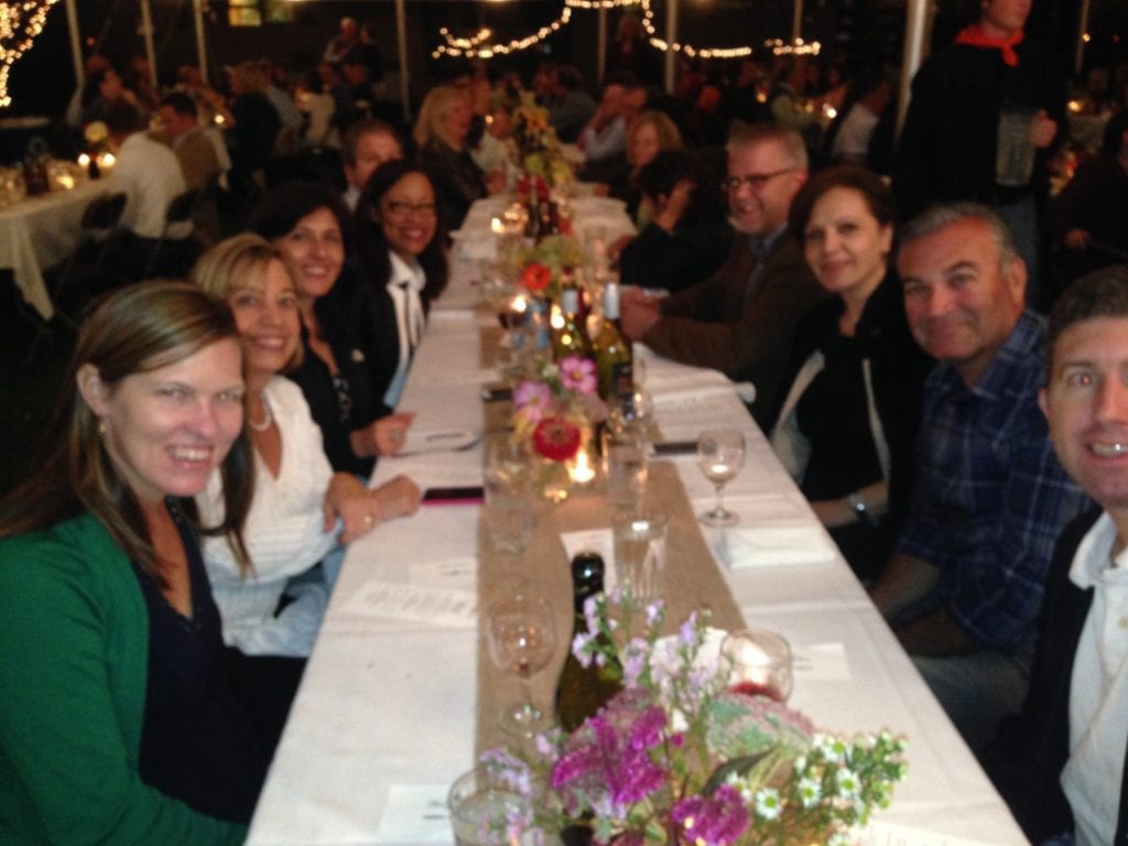 Dinner is served al fresco under a tent at Feast on the Farm in 2015. Courtesy photo