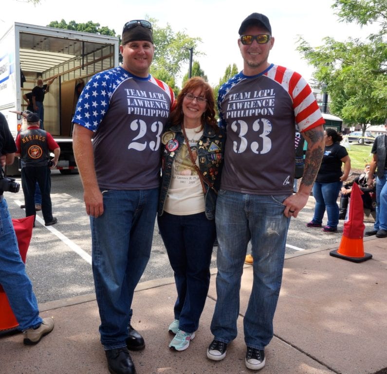 West Hartford resident Leesa Philippon (center) with her son's friends and fellow Marines Ryan Shea (left) and Ryan Brehm. Photo credit: Ronni Newton