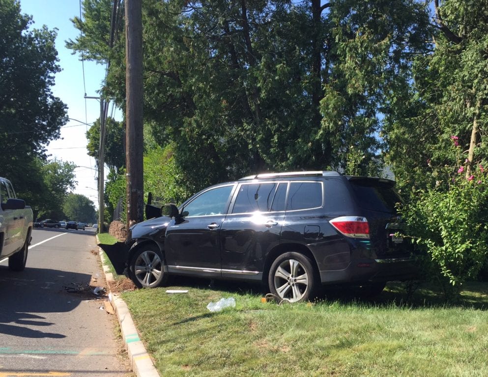 The driver of a Toyota Sienna crashed into a utility pole on South Main Street on Saturday. Photo credit: Ronni Newton