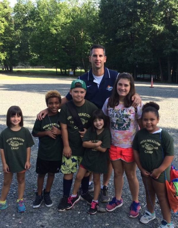 Wolcott third grade teacher Eric Feeney with the Sohn and Collier children at High Meadow Day Camp. Courtesy of Eric Feeney