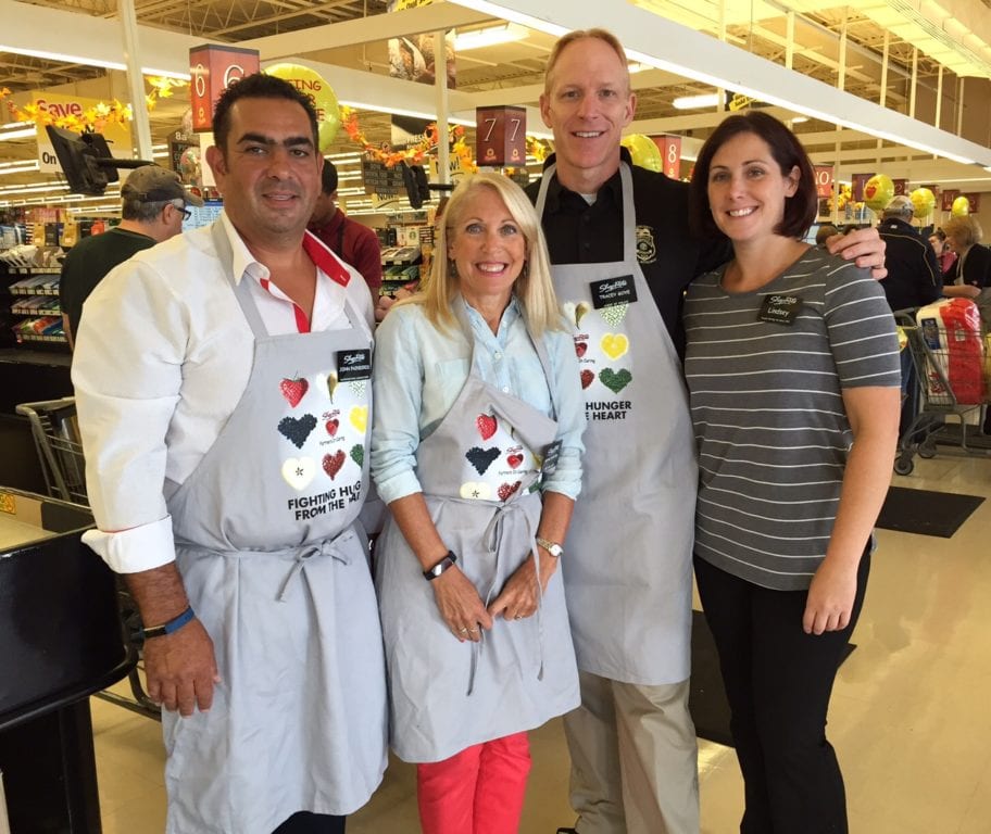 From left: Effie's Place owner John Paindiris, Ronni Newton, Police Chief Tracey Gove, ShopRite Manager Lindsey Larson. 