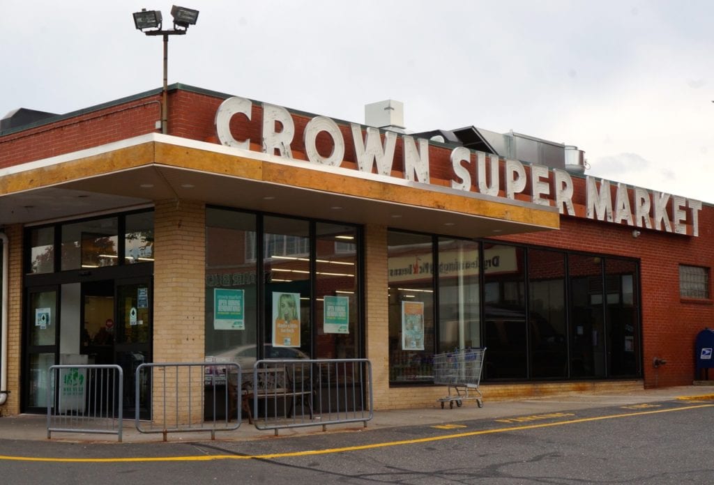 The Crown Super Market sign will remain on the exterior of the building, but blue trim will be added. Photo credit: Ronni Newton