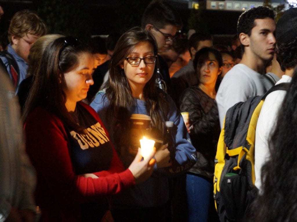 Friends attend the candlelight vigil for Jeffny Pally. Photo credit: Ronni Newton
