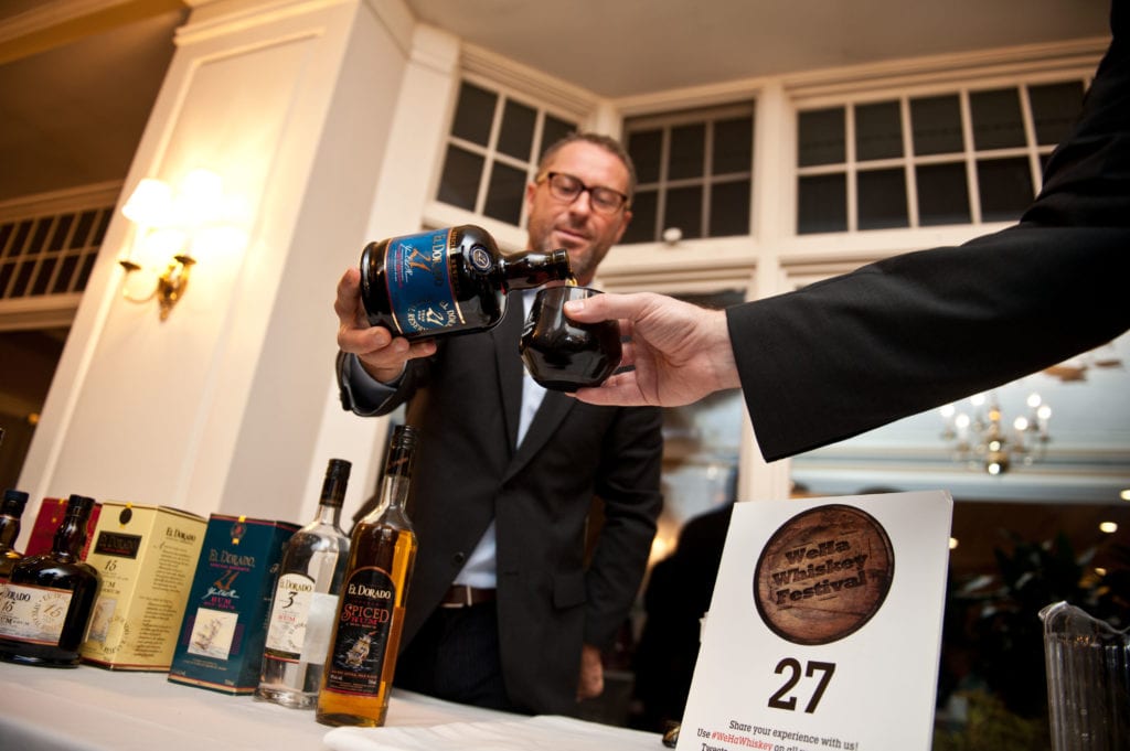 The WEHA Whiskey Festival, held at Hartford Golf Club, offered samples of 200 different kinds of whiskey. Photo Credit: Cheyney Barrieau, Eat IN CT